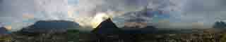 360 degree panaroma showing the city in its entirety as the sun begins to set behind 'El Cerro de las Mitras'