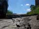 Where the soil has been washed away the layers of hardened lava can be seen